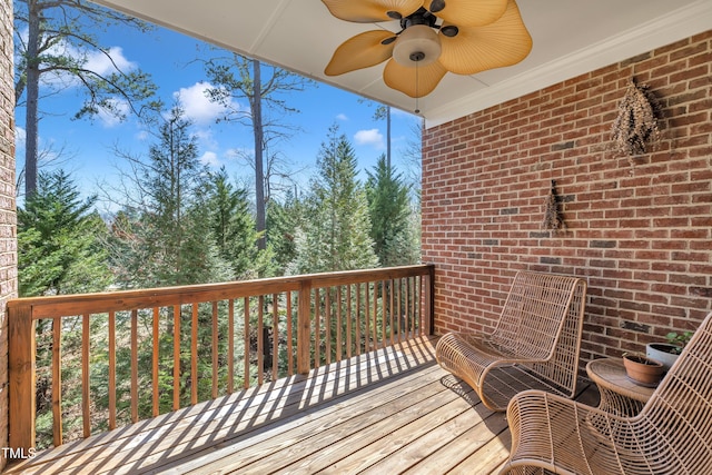 wooden terrace with ceiling fan