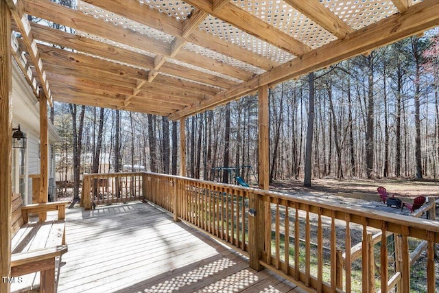 wooden deck featuring a pergola