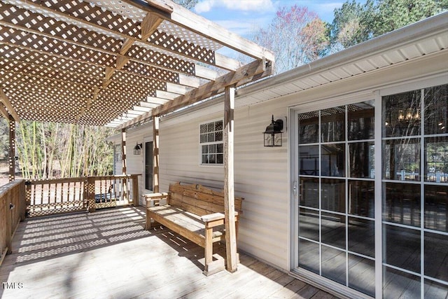 wooden terrace with a pergola