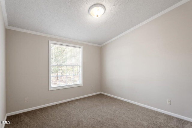 carpeted spare room featuring a textured ceiling, crown molding, and baseboards