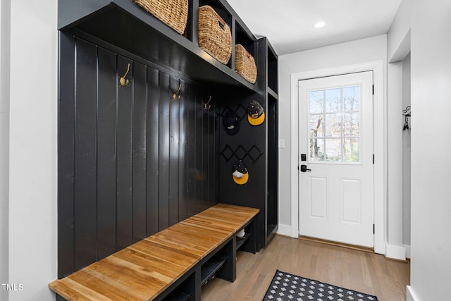 mudroom with light wood-style flooring, recessed lighting, and baseboards