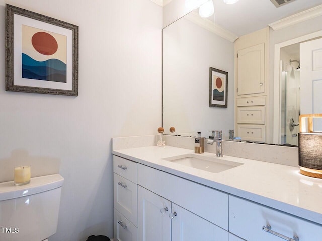 full bath with vanity, visible vents, a stall shower, ornamental molding, and toilet