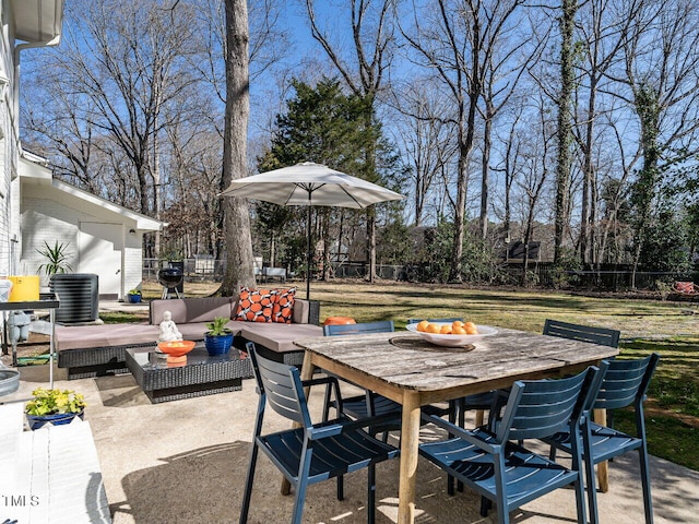 view of patio / terrace featuring an outdoor hangout area, outdoor dining space, and fence