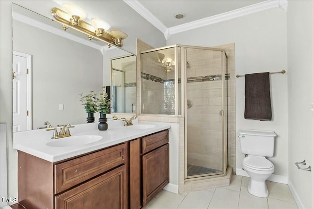 full bathroom with double vanity, a stall shower, crown molding, and a sink