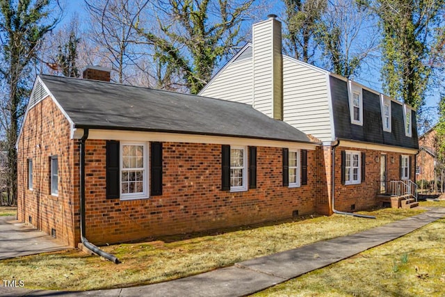350 W Lake Trl, Mebane, NC 27302 - view of side of home featuring a shingled roof, a yard, brick siding, and a chimney
