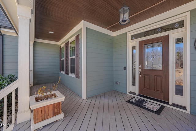 doorway to property featuring a porch