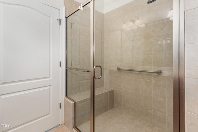 full bathroom featuring a shower stall