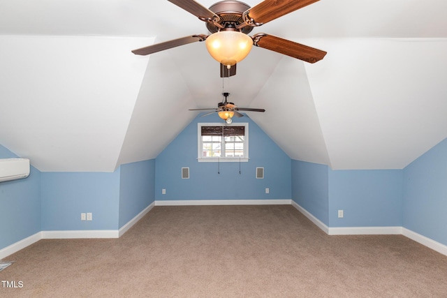 additional living space featuring an AC wall unit, carpet, baseboards, ceiling fan, and vaulted ceiling