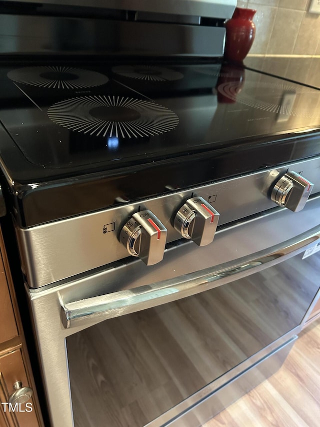 details featuring stainless steel range with electric cooktop