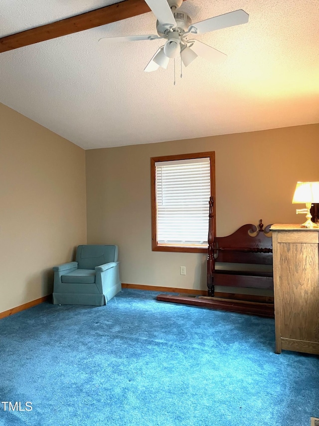 unfurnished room featuring ceiling fan, baseboards, carpet floors, and a textured ceiling