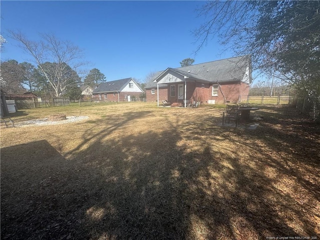 view of yard featuring fence