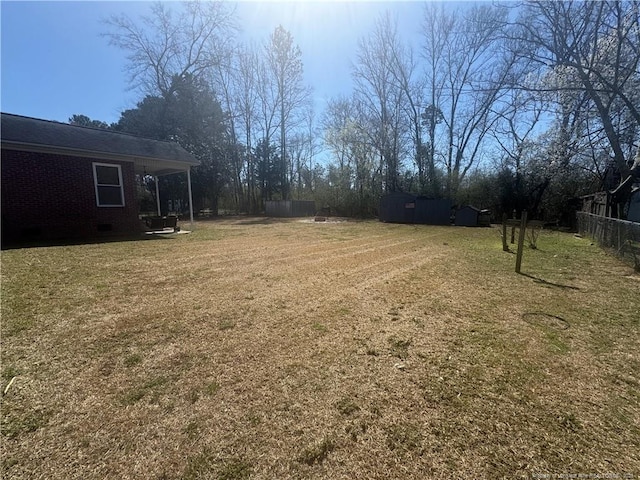 view of yard featuring fence