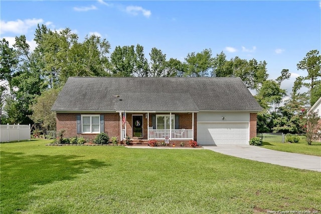 ranch-style home with a front lawn, driveway, fence, covered porch, and a garage