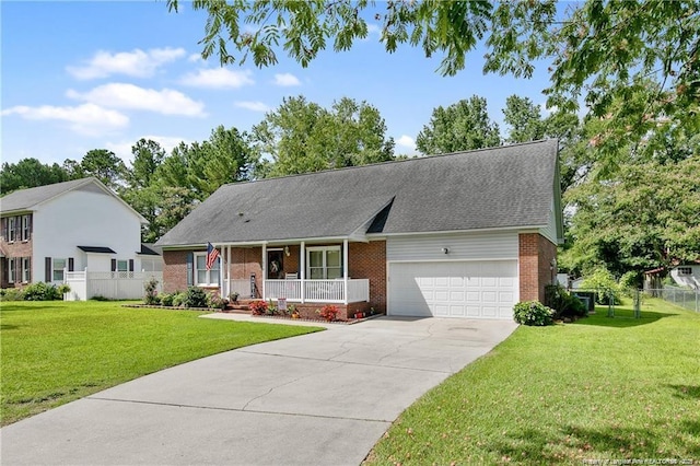 view of front facade featuring a garage, covered porch, concrete driveway, and a front yard