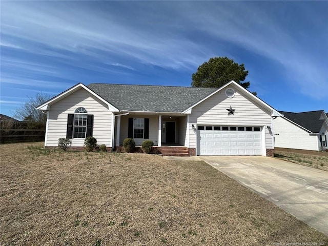 single story home featuring concrete driveway, an attached garage, and a shingled roof