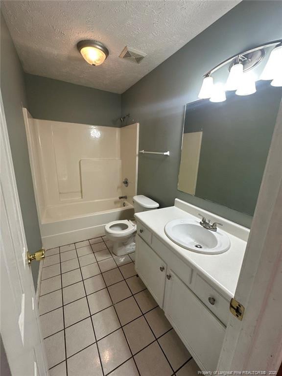 bathroom with tile patterned flooring, visible vents, shower / washtub combination, toilet, and vanity