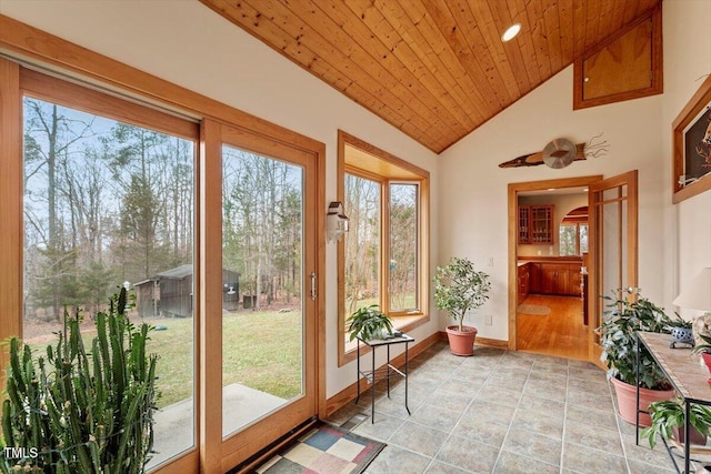 sunroom / solarium with wooden ceiling and lofted ceiling