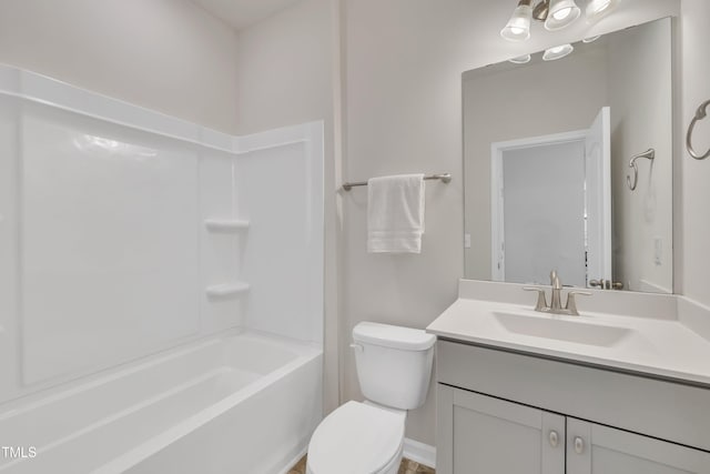 bathroom with toilet and vanity