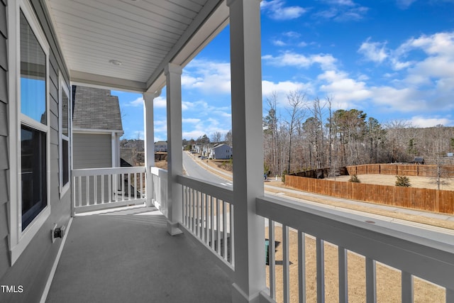 balcony featuring a residential view