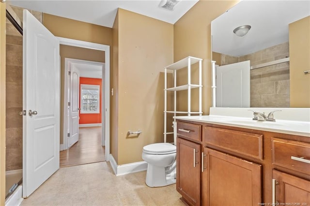 full bath featuring vanity, visible vents, a tile shower, tile patterned flooring, and toilet