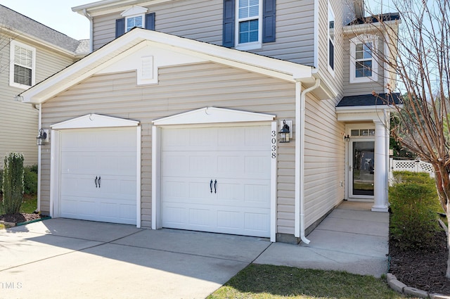 garage featuring driveway