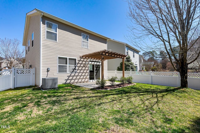 rear view of property featuring central air condition unit, a lawn, a gate, a pergola, and a fenced backyard