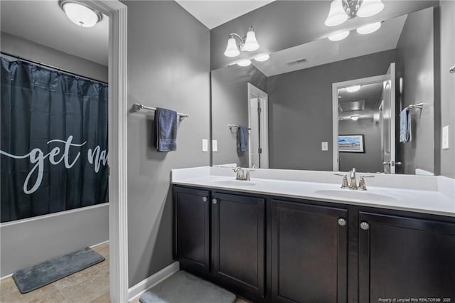 bathroom featuring double vanity, visible vents, shower / bath combination with curtain, and a sink