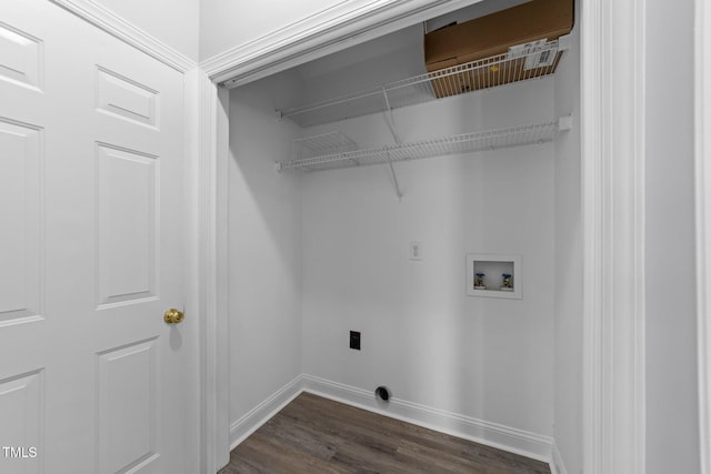 laundry room featuring washer hookup, laundry area, baseboards, and dark wood-type flooring