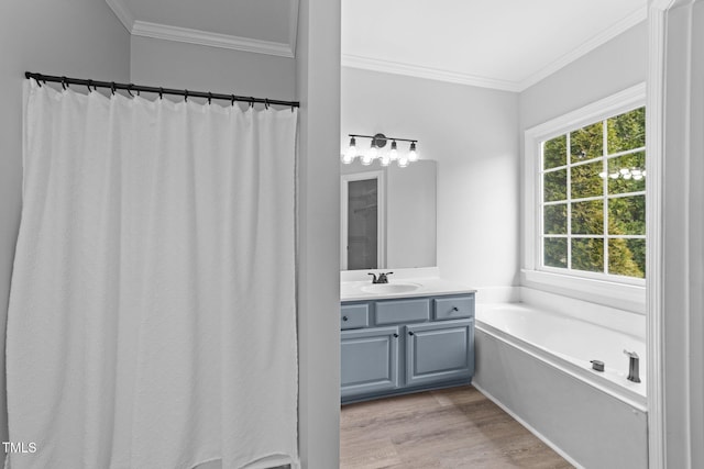 full bath with wood finished floors, ornamental molding, vanity, and a bath