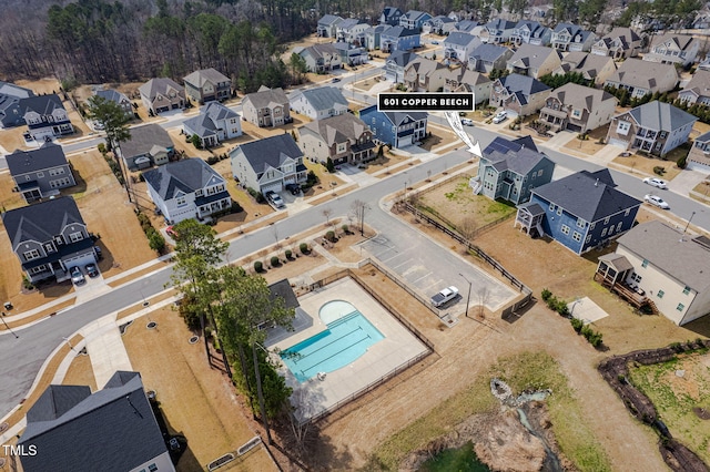 birds eye view of property with a residential view