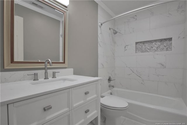 bathroom featuring visible vents, toilet, vanity, and shower / bathing tub combination