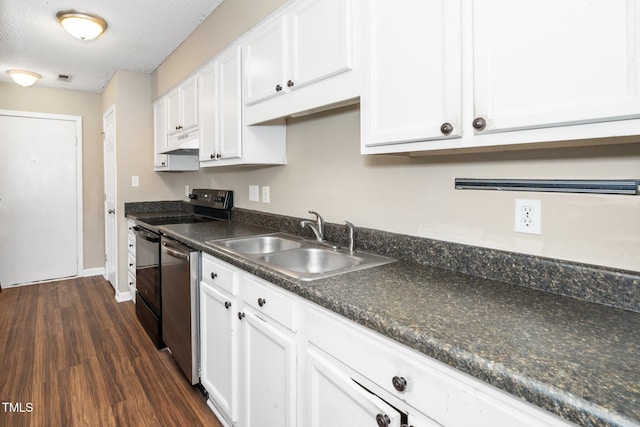 kitchen with under cabinet range hood, white cabinets, dishwasher, and a sink