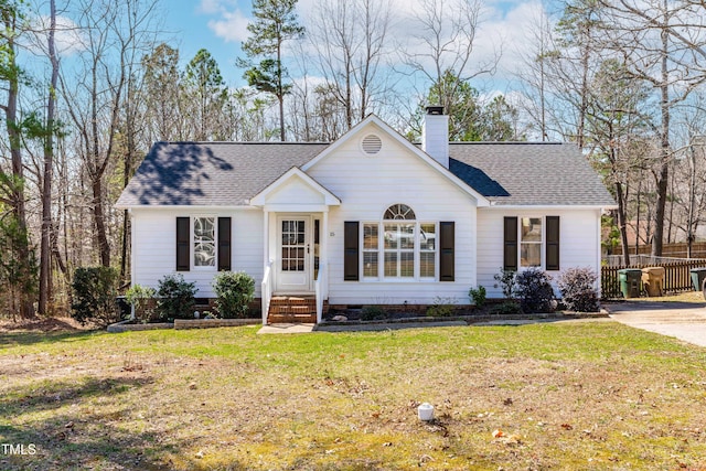 single story home featuring fence, a front yard, roof with shingles, a chimney, and crawl space