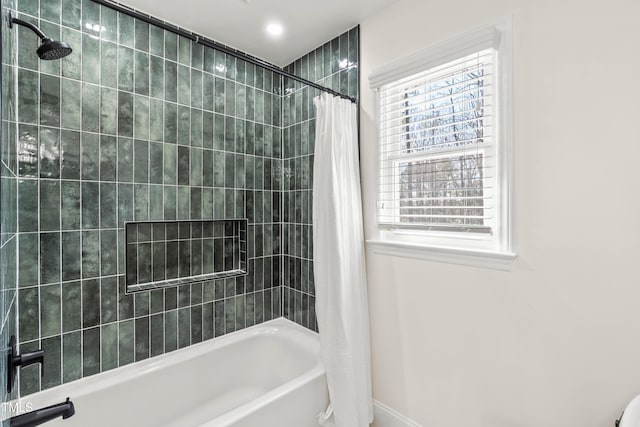 full bathroom featuring shower / bath combination with curtain