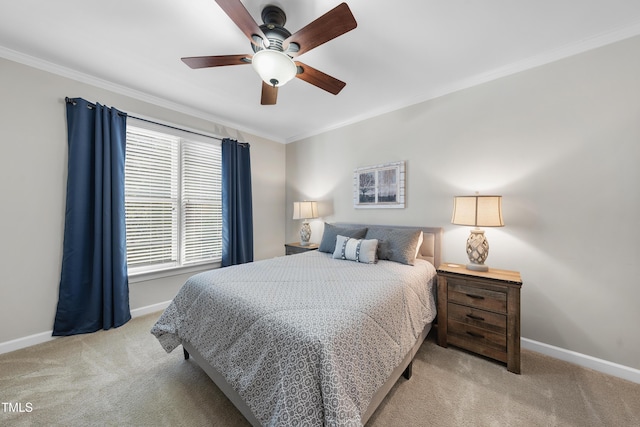 bedroom with crown molding, light colored carpet, and baseboards