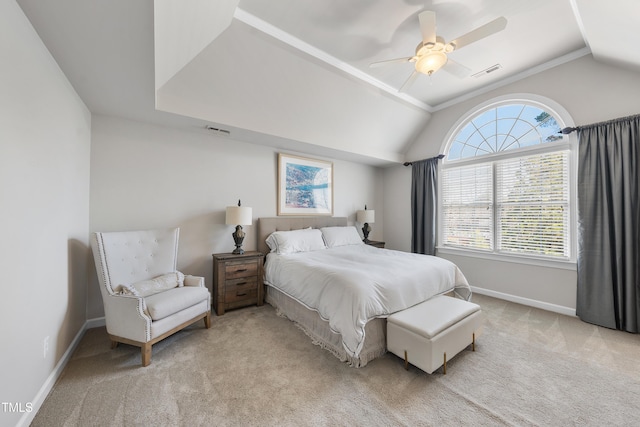 bedroom featuring visible vents, multiple windows, light colored carpet, and vaulted ceiling