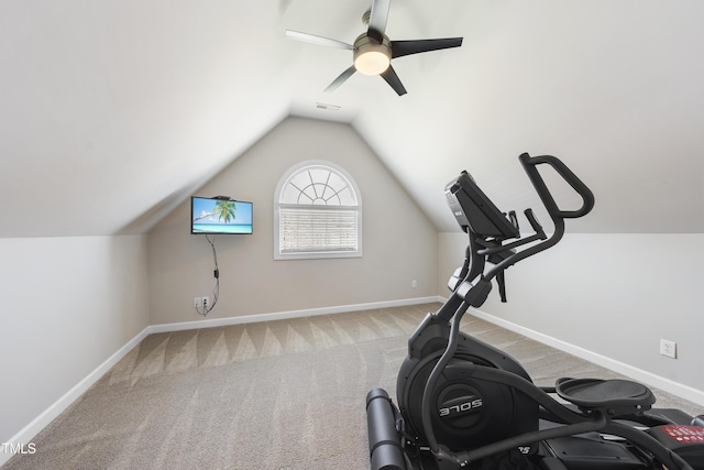 exercise area with visible vents, lofted ceiling, a ceiling fan, carpet floors, and baseboards