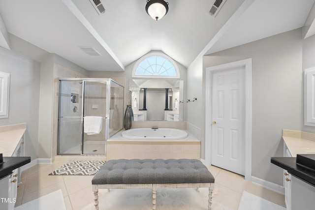 bathroom with tile patterned floors, visible vents, lofted ceiling, and vanity