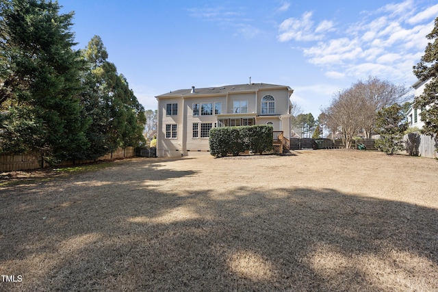 back of property with crawl space and a fenced backyard