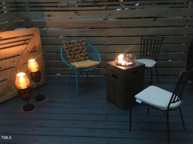 balcony with an outdoor fire pit