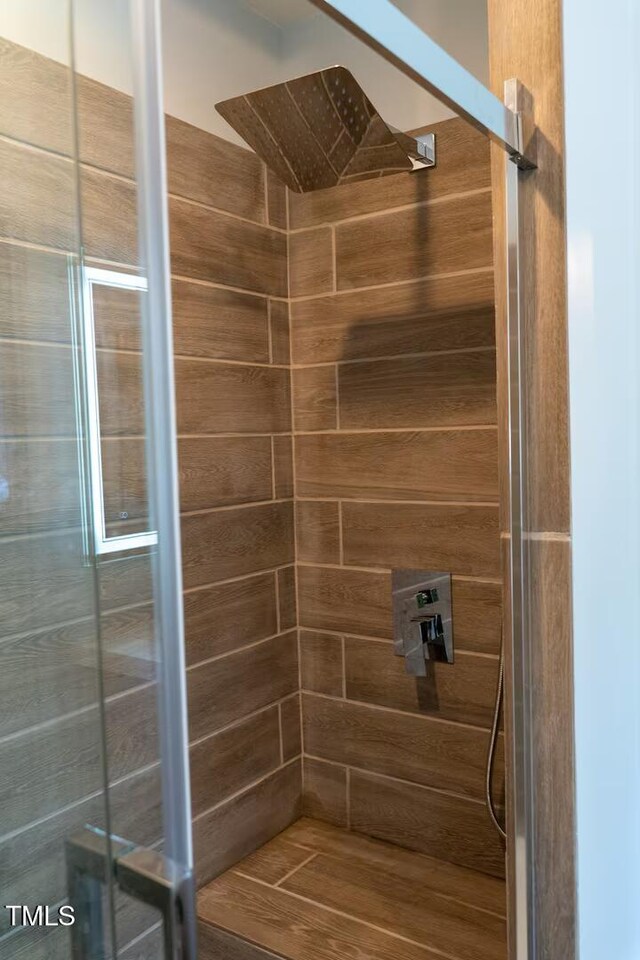 bathroom with a stall shower