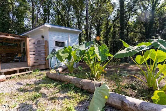 view of yard with a deck