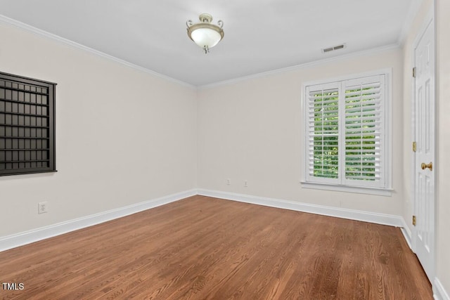 405 Silver Creek Trl, Chapel Hill, NC 27514 - spare room featuring wood finished floors and ornamental molding