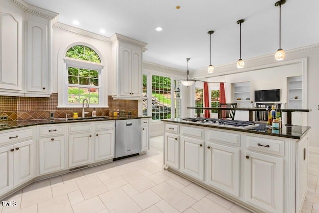 405 Silver Creek Trl, Chapel Hill, NC 27514 - kitchen featuring stainless steel dishwasher, gas cooktop, dark countertops, backsplash, and ornamental molding