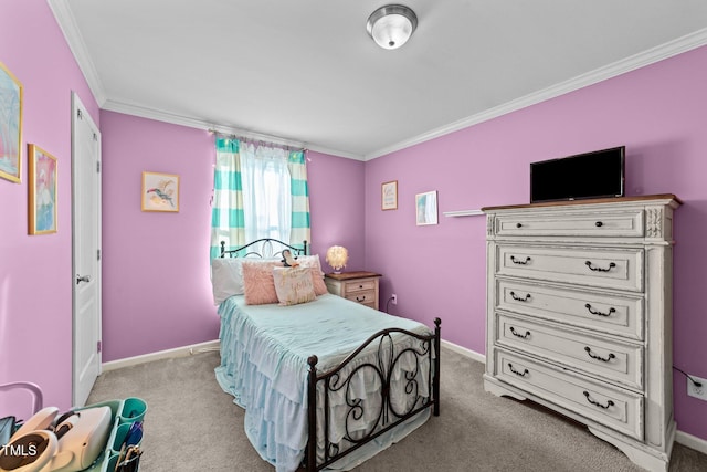 bedroom featuring carpet flooring, crown molding, and baseboards