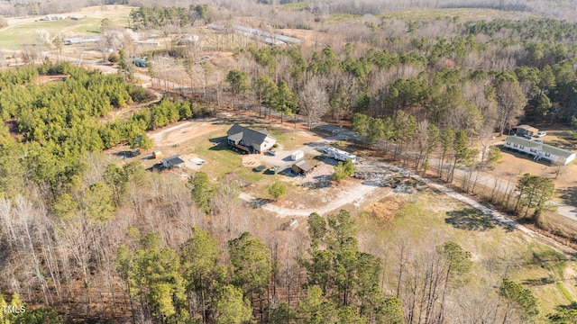 bird's eye view with a forest view