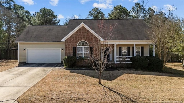 view of front of house with brick siding, concrete driveway, covered porch, and a garage