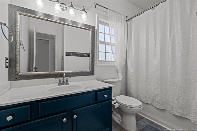 bathroom with toilet, vanity, and shower / bath combo