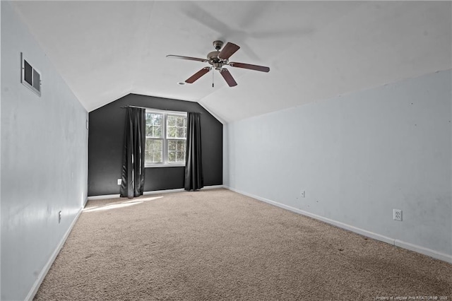 bonus room featuring visible vents, ceiling fan, baseboards, carpet, and lofted ceiling