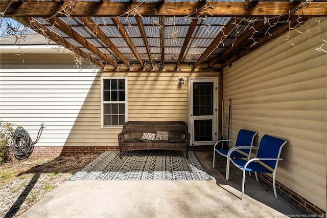 view of patio featuring a pergola